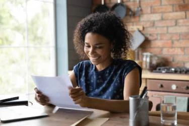 black woman writing letter